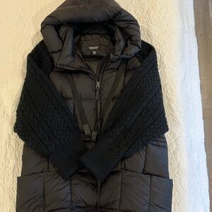 Cozy Winter Coat! It has a hood for warmth.